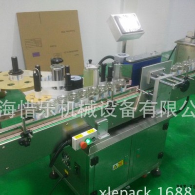 江蘇顏料圓瓶自動(dòng)貼標(biāo)機(jī)   塑料瓶貼標(biāo)機(jī)  牛奶玻璃瓶貼標(biāo)機(jī)